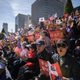 Anti-government activists attend a rally in Seoul on Oct. 9 calling for president Moon Jae-in to step down over the appointment of former justice minister Cho Kuk.